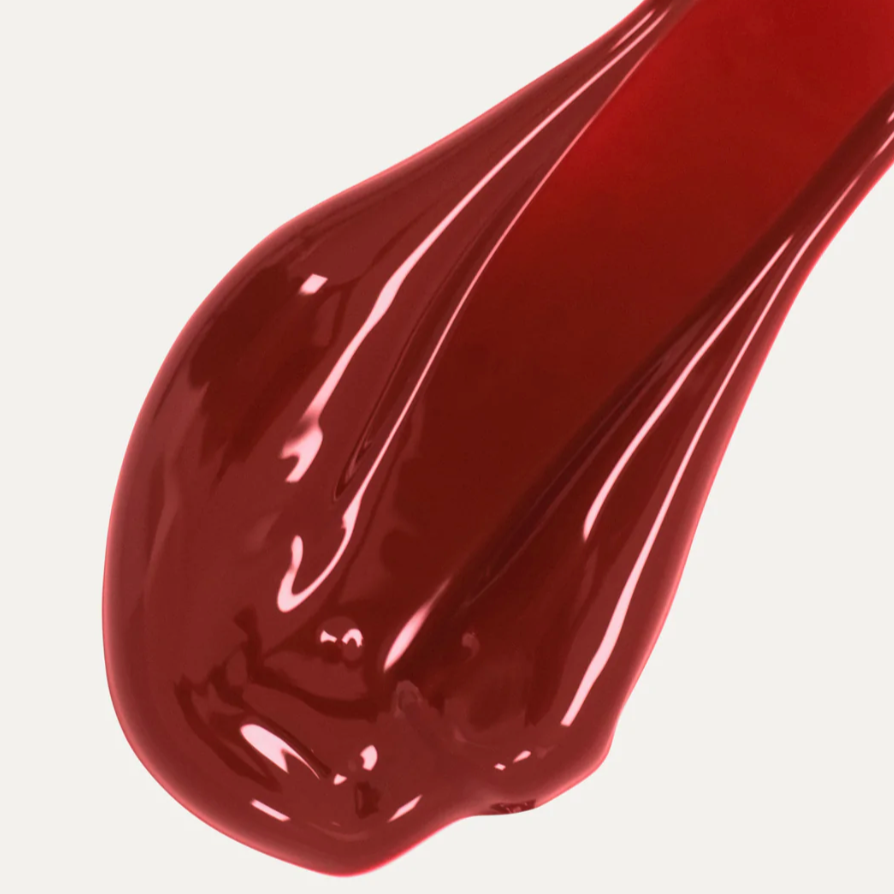 Lip colour serum shade Deep is a dark red color.